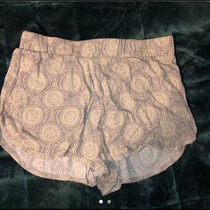 Cute tan flowy floral shorts.